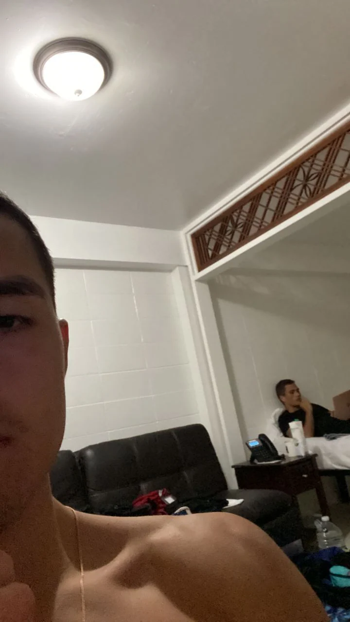 Eli's selfie with Luc Tate in the background